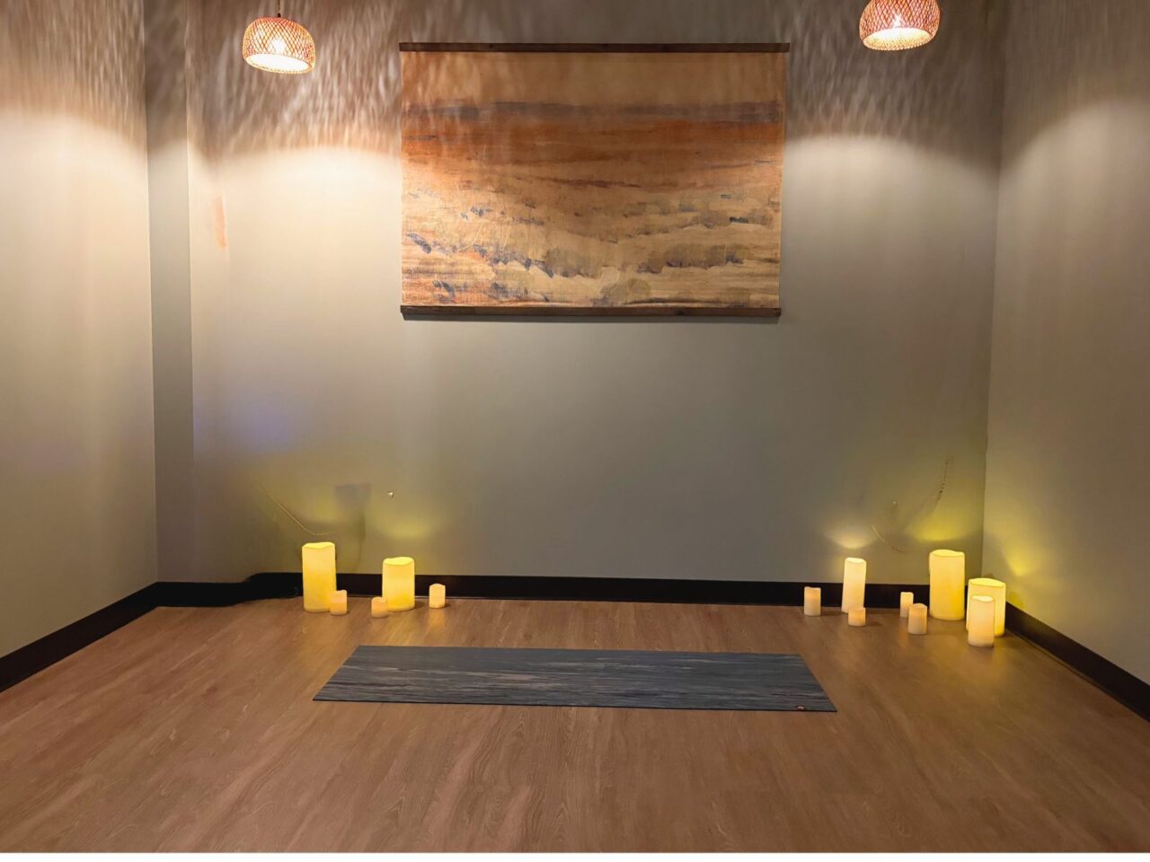 Candlelit semi-private yoga studio at Heart Spring Health in SE Portland