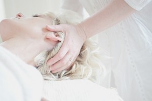 Woman receiving craniosacral therapy